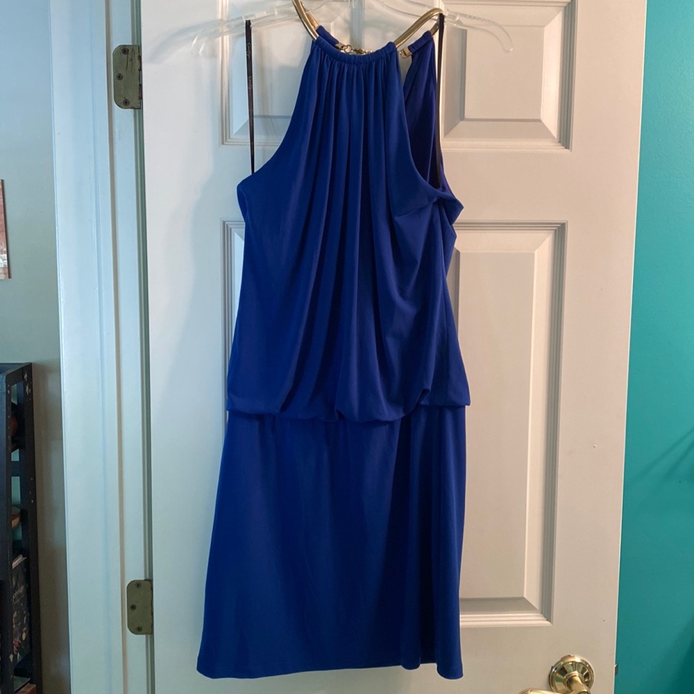 Blue dress with gold chain necklace attached